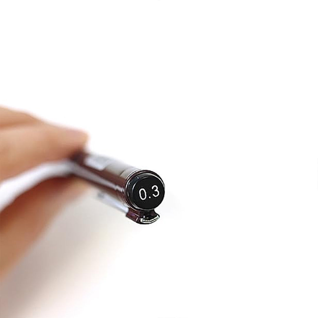 Close-up of a Rotring Tikky Graphic Fineliner with a 0.3mm tip held by a hand on a white background