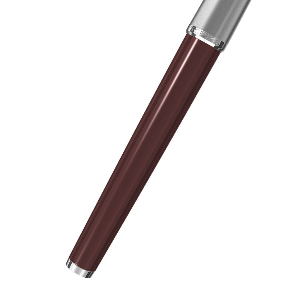 Scrikss Metropolis Rollerball Pen in Burgundy Barrel showing half body on a white background