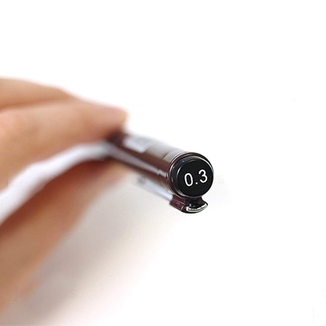 Close-up of a Rotring Tikky Graphic Fineliner with a 0.3mm tip, showing the pen's tip and a hand holding it.